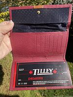Interior view showing card slots, lining, and Tilley card