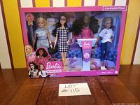 Front view of sealed Barbie Campaign Team 4-doll playset box