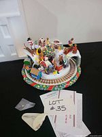 Overall view of circular train display with village scene