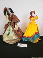 Full view of both Franklin Heirloom dolls standing side by side