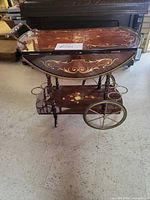 Full view of the two-tier Italian inlaid wood serving cart