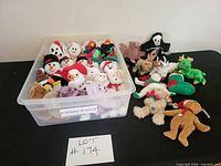 Full lot in bin and additional plush on table