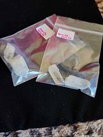 Two resealable bags each holding two quartz points