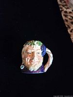 Front view of Bacchus Toby mug