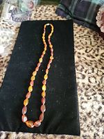 Necklace laid flat showing full bead strand