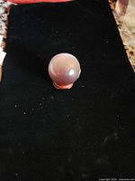 Sphere on stand, full view