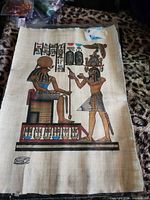 Front view of painted papyrus artwork