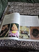 open magazine showing insect photographs and text
