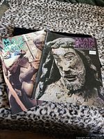 Front covers of issues 54 and 56