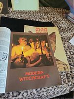 Front booklet showing Modern Witchcraft feature with other issue beneath