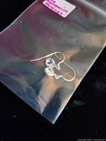Earrings in plastic bag