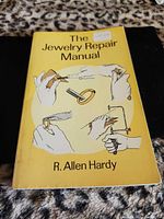 Front cover of softcover book "The Jewelry Repair Manual"