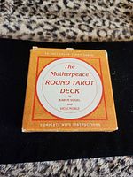 Front of orange box with deck title and details