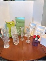 Group shot of all vases with boxes and styrofoam