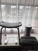All four items: shower stool, digital scale, pedal trash can, bath mat