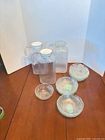 overview of three pitchers and seven bowls