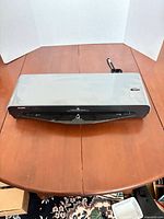 Top view of gray and black laminator on table