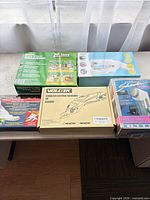 All five boxed items displayed on tabletop