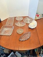 All nine pieces arranged on table