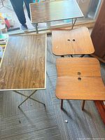 Top view of all three tray tables showing different tops and legs