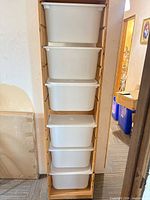 full front view of pine cart with five white bins inserted