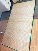 Full view of large Traum cutting mat on floor