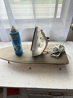 Iron, tabletop sleeve board, Easy-On starch can on surface