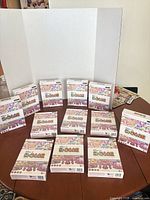 Front view showing all twelve boxed games