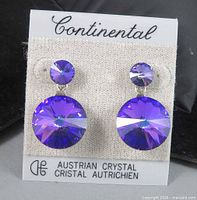 Front view of earrings on Continental card