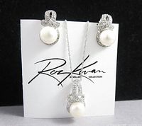 Set displayed on card showing necklace and earrings