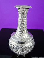 Full view of silverplate chased floral vase