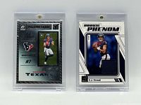 Fronts of both rookie cards in holders