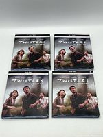Front view of four sealed Twisters Blu-ray copies
