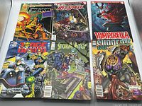 Six comic books laid out, showing all covers