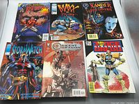 Front covers of six assorted comic books laid out in two rows