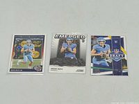 All three Drake Maye rookie cards side by side