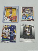 Overview of all four Jayden Daniels rookie cards in holders