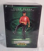 Front of original retail box showing Tiger Woods Pro Shots Ultimate imagery