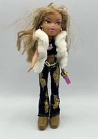 Front view of Yasmin doll showing full outfit and accessories