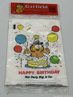 Front view of sealed package showing Garfield header and bag design