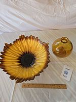 Top view showing sunflower bowl, bud vase and scale