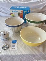 Overall lot showing three bowls, boxed Anchor Hocking set and covered crock