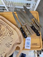 Knives arranged on board