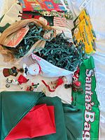 Overview of lot showing lights, Santa bag, stocking, cloth pieces, ornaments