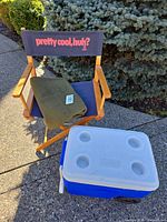 Entire lot showing cooler, blanket and chair together