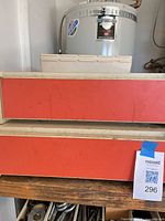 Two red-front drawers forming the lot