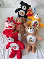 Group shot of all seven plush toys