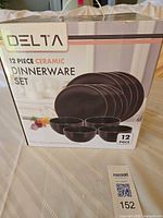 Front of boxed 12-piece Delta ceramic dinnerware set