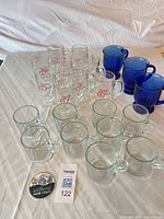 All 21 mugs grouped on table