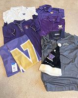 Overview of all shirts, flag and hat